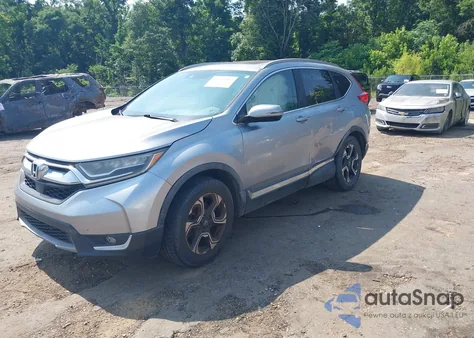 2017 Honda Cr-V Touring from USA, damaged, VIN 5J6RW1H90HL014371